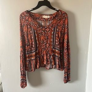 Burnt orange and navy blouse